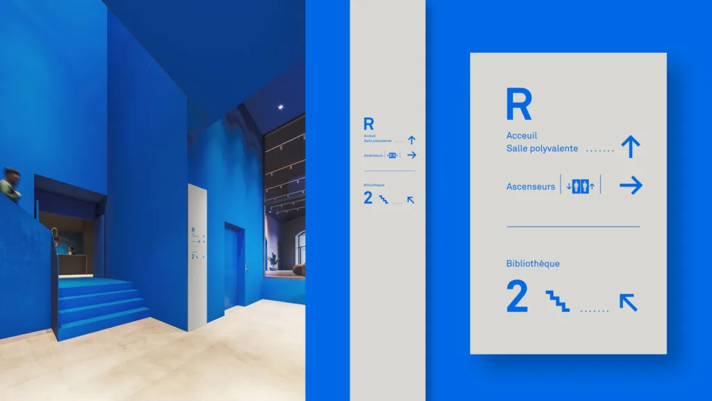 Escalier bleu et panneau directionnel bleu d'une Maison de la culture