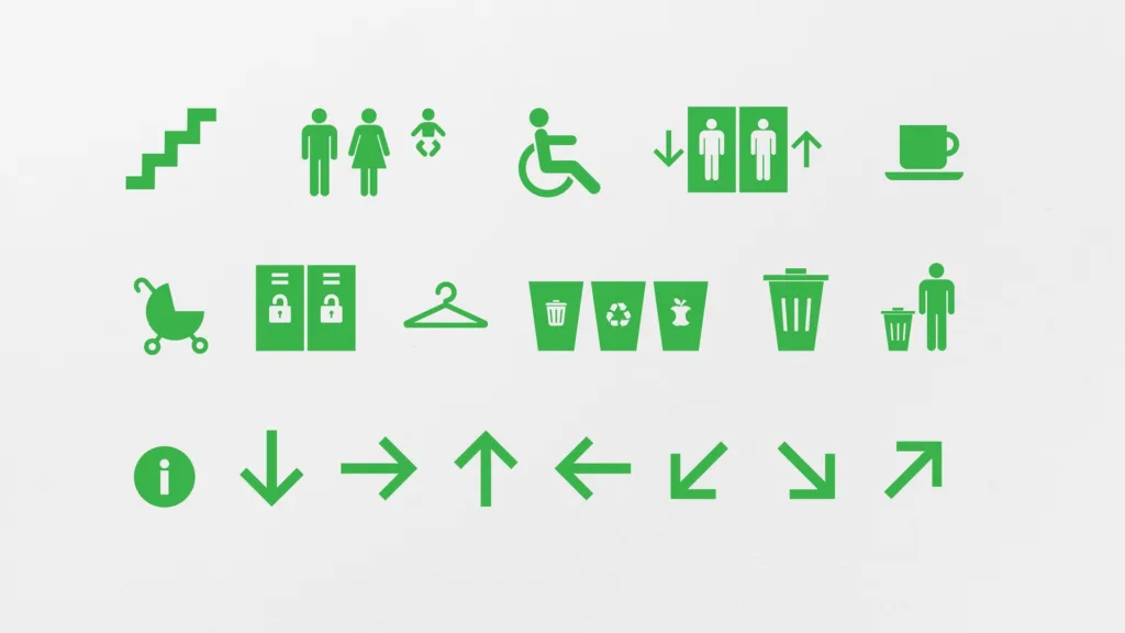 Pictogrammes et flèches de la signalétique, en vert