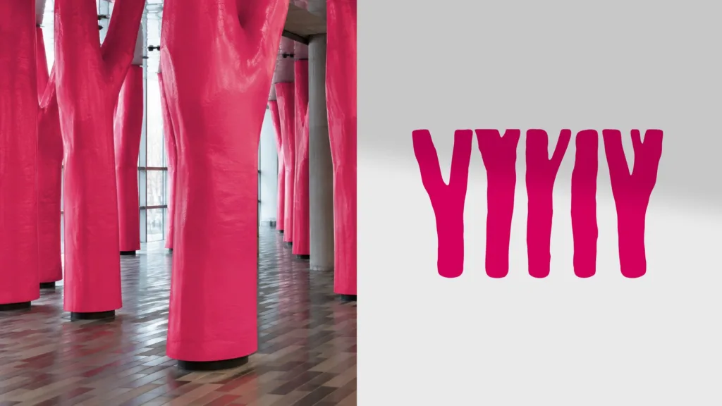 Colonnes roses du Palais des congrès et leur motif graphique décliné en logo